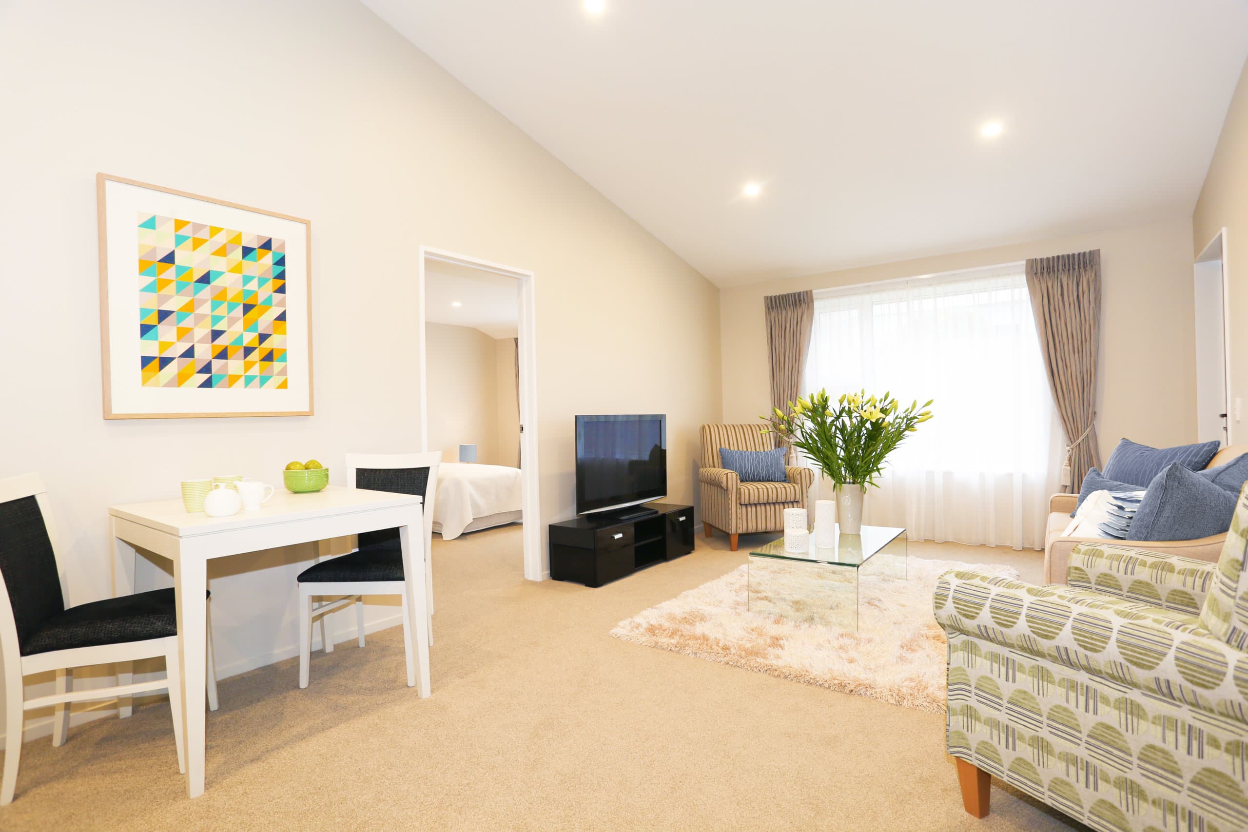 Hutt Gables Villa lounge area with dining tables