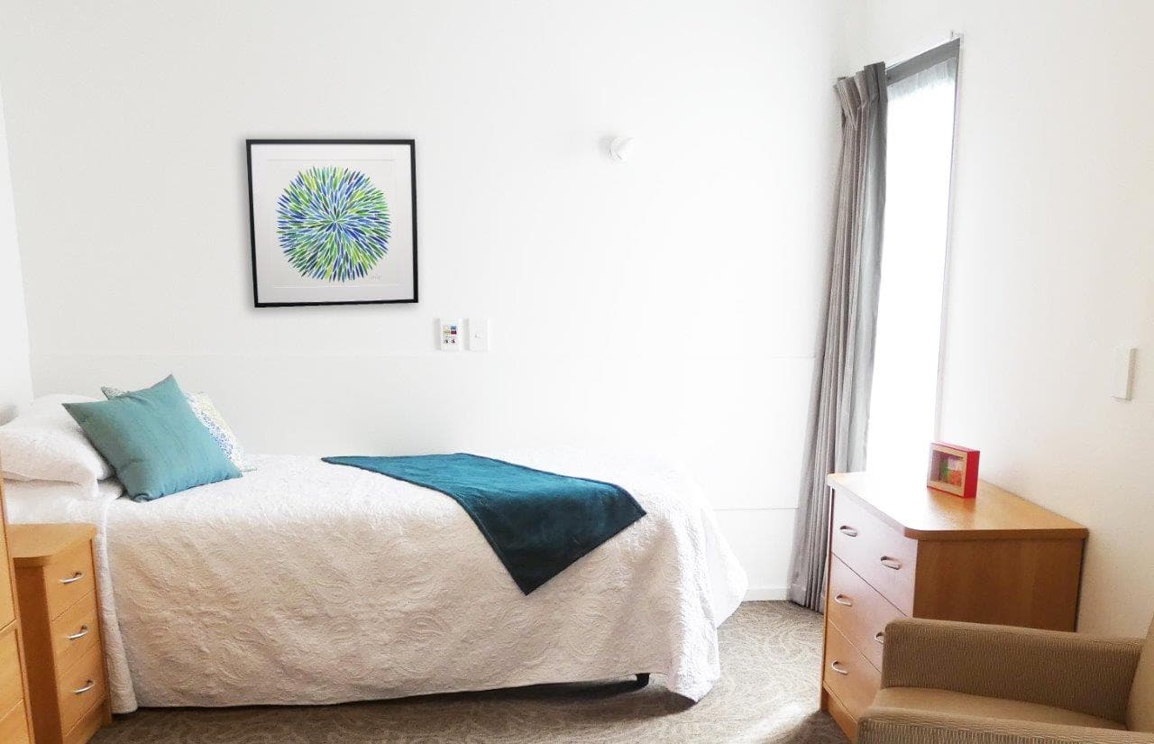 Oceania Aged Care Room with bed and chest of drawers
